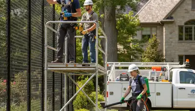 Richmond, VA tree service applying deer deterrent protection for trees and landscape plantings